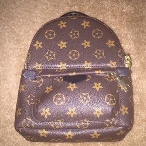 mini backpack {read description}